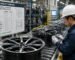 A production line of custom alloy wheels being inspected for quality compliance